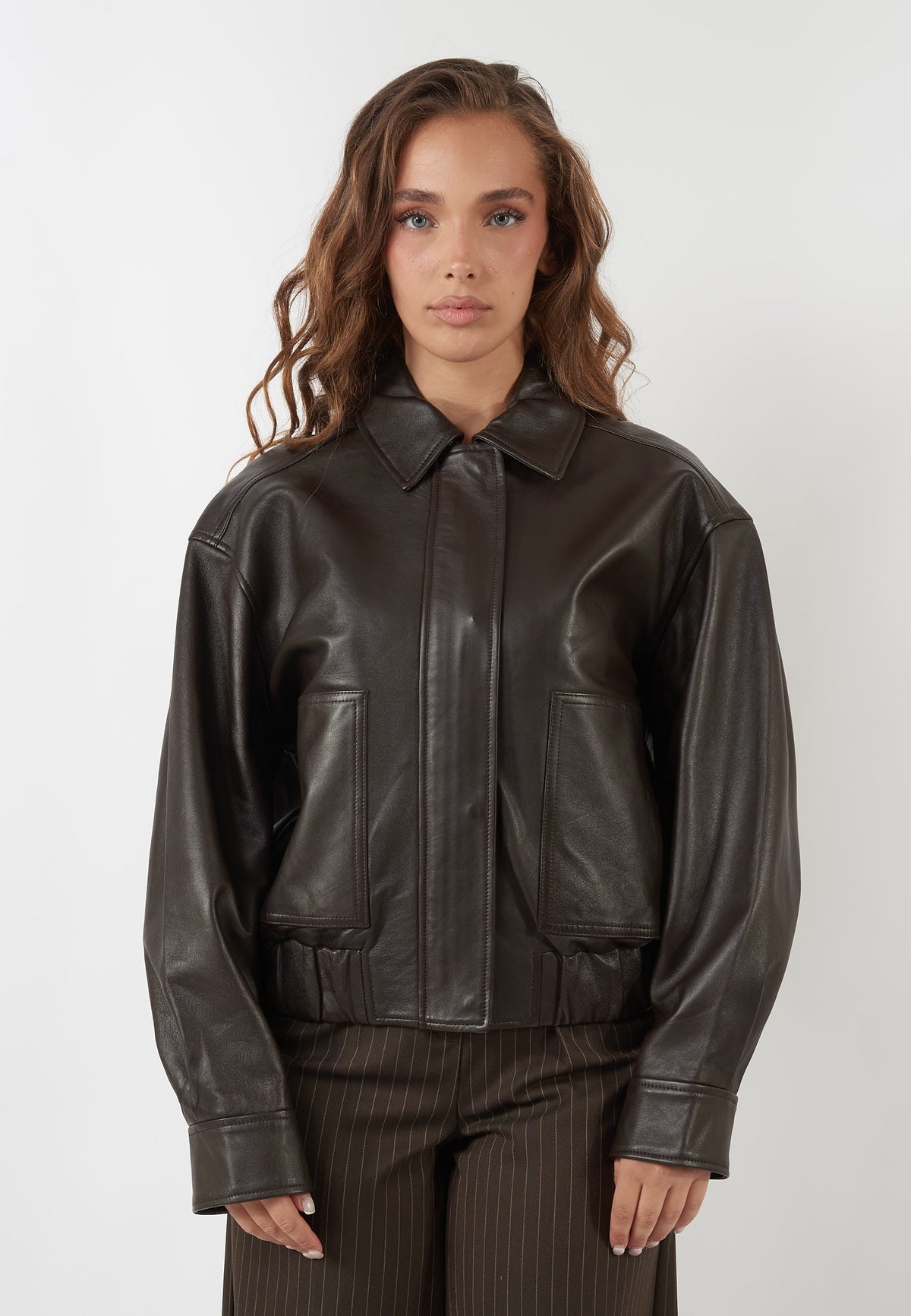 BOMBER FIBBIA MARRONE