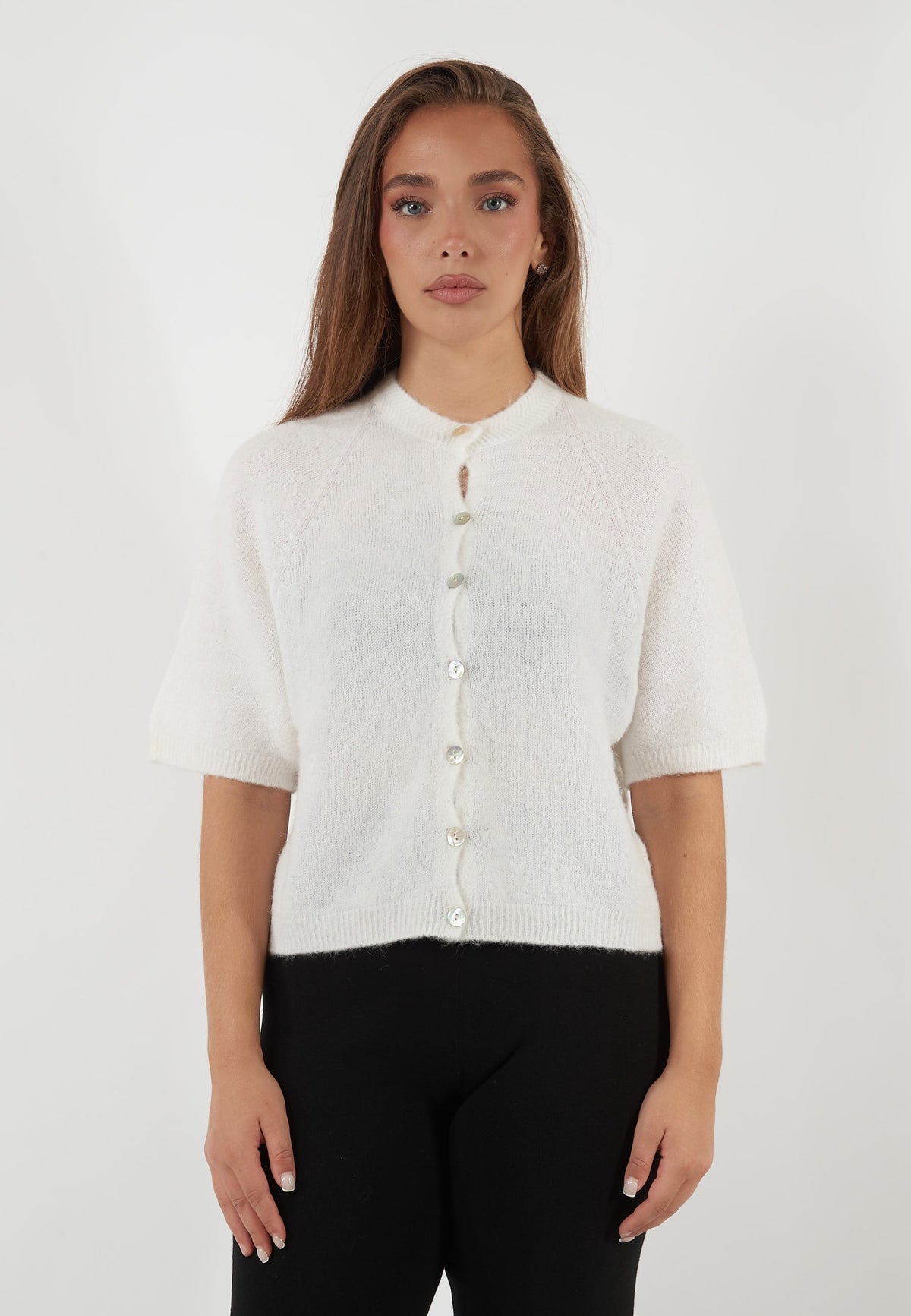 CARDIGAN A MANICHE CORTE BIANCO